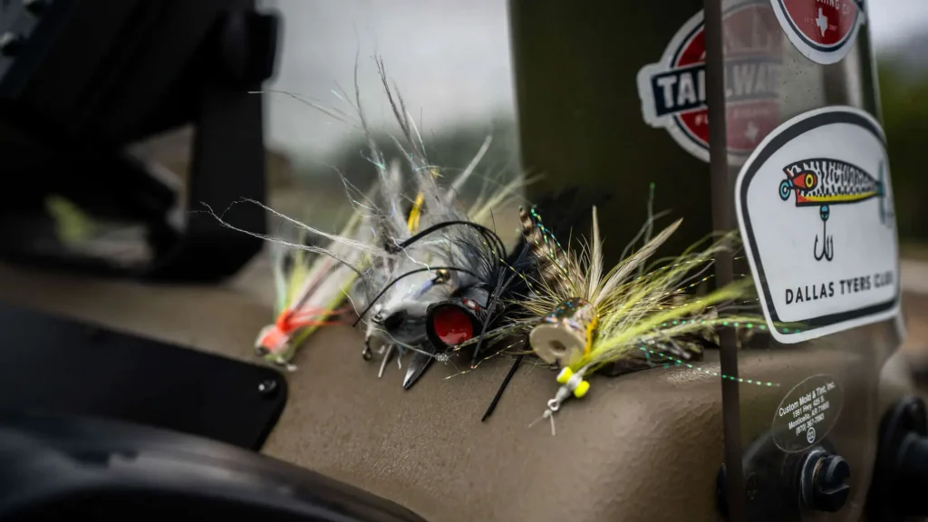 Close-up of best fly fishing flies used on Lake Whitney for striped bass, largemouth, and sand bass